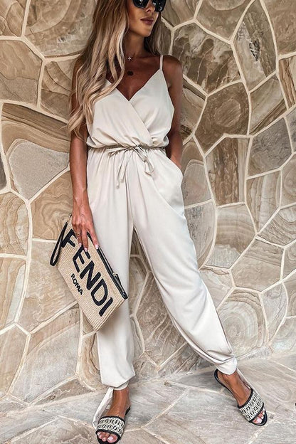 Stunncal Pocketed Satin Wrap Jumpsuit